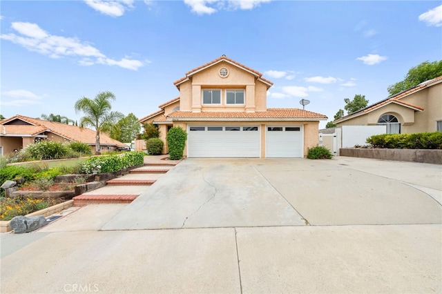 29678 Deal Ct, Temecula, CA 92591 - mediterranean / spanish house with a tiled roof, stucco siding, driveway, a gate, and a garage