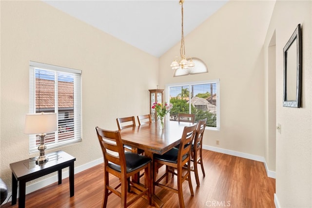 29678 Deal Ct, Temecula, CA 92591 - dining room with a chandelier, wood finished floors, and high vaulted ceiling