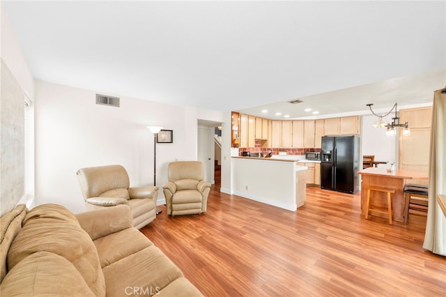 29678 Deal Ct, Temecula, CA 92591 - living area featuring light wood finished floors, a chandelier, and recessed lighting