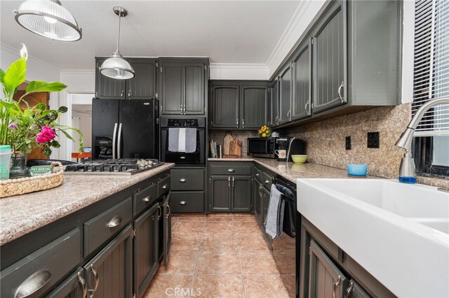 3367 M St, Merced, CA 95348 - kitchen featuring black appliances, light countertops, backsplash, ornamental molding, and pendant lighting