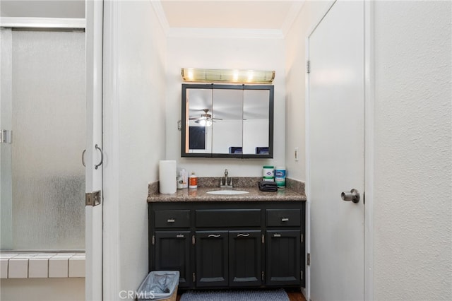 3367 M St, Merced, CA 95348 - bathroom featuring ornamental molding, vanity, and ceiling fan