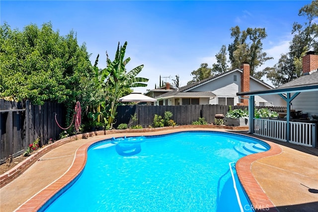 3367 M St, Merced, CA 95348 - view of pool featuring a fenced backyard