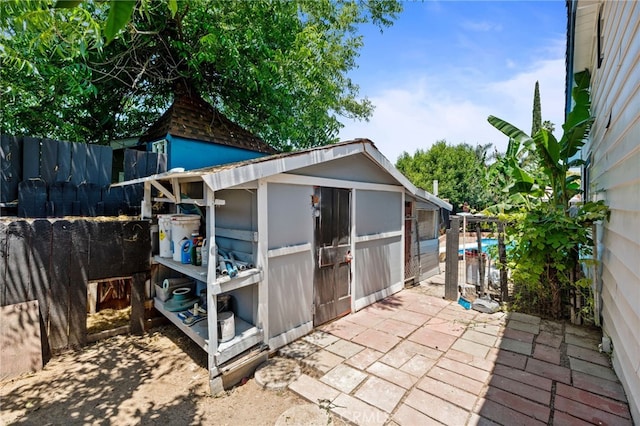 3367 M St, Merced, CA 95348 - view of patio / terrace featuring a storage shed