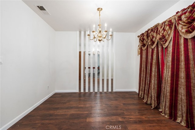 3367 M St, Merced, CA 95348 - unfurnished dining area with a chandelier and wood finished floors
