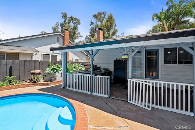 3367 M St, Merced, CA 95348 - view of pool with a patio and a grill
