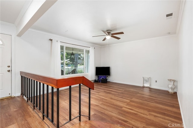 3367 M St, Merced, CA 95348 - entryway with ceiling fan, wood finished floors, and ornamental molding