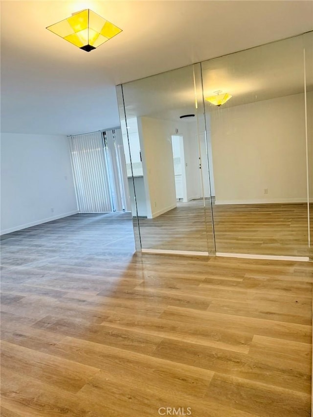 4170 Elm Ave Unit 213, Long Beach, CA 90807 - spare room with wood finished floors and baseboards