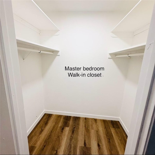 4170 Elm Ave Unit 213, Long Beach, CA 90807 - walk in closet featuring dark wood-style floors