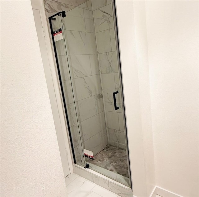 4170 Elm Ave Unit 213, Long Beach, CA 90807 - bathroom with marble look tiles and a stall shower
