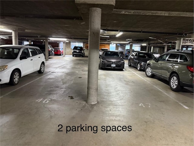 4170 Elm Ave Unit 213, Long Beach, CA 90807 - parking garage featuring a garage door opener