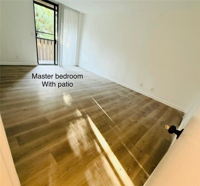 4170 Elm Ave Unit 213, Long Beach, CA 90807 - empty room featuring wood finished floors