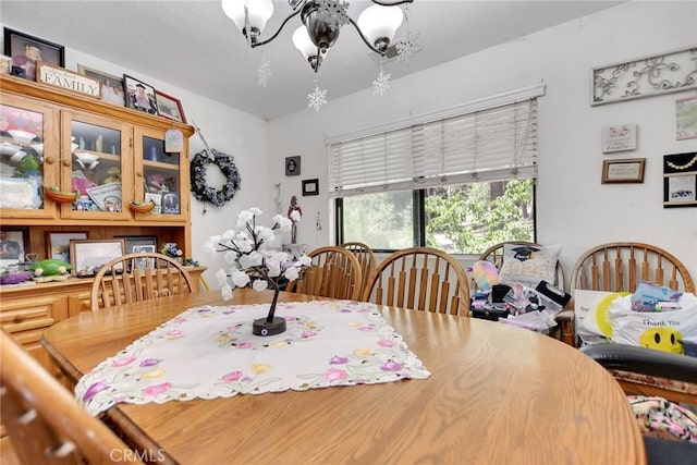 23201 Cardinal Rd, Wrightwood, CA 92397 - dining space featuring a chandelier