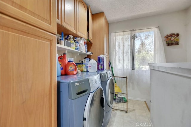 23201 Cardinal Rd, Wrightwood, CA 92397 - washroom featuring washer and clothes dryer, cabinet space, and a textured ceiling