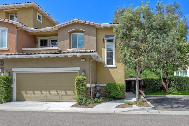 6925 Tourmaline, Carlsbad, CA 92009 - multi unit property with a garage, stucco siding, and a tiled roof