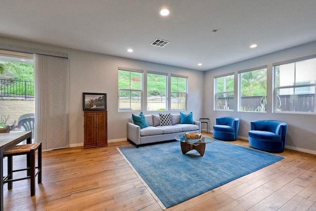 6925 Tourmaline, Carlsbad, CA 92009 - living room with light wood-type flooring and recessed lighting
