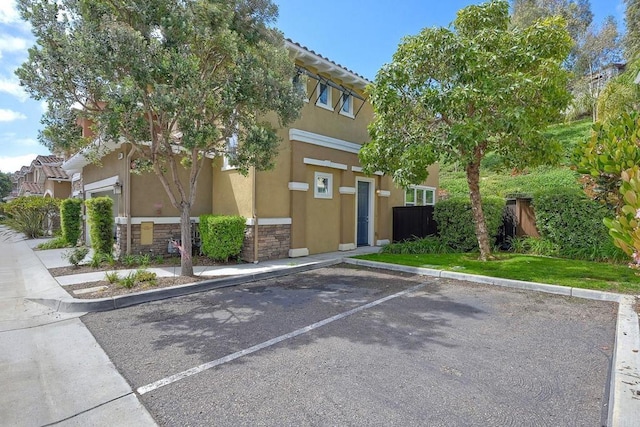 6925 Tourmaline, Carlsbad, CA 92009 - view of building exterior featuring uncovered parking