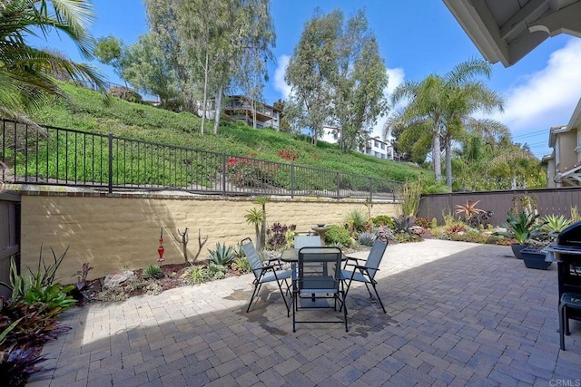 6925 Tourmaline, Carlsbad, CA 92009 - fenced backyard with outdoor dining area and a patio