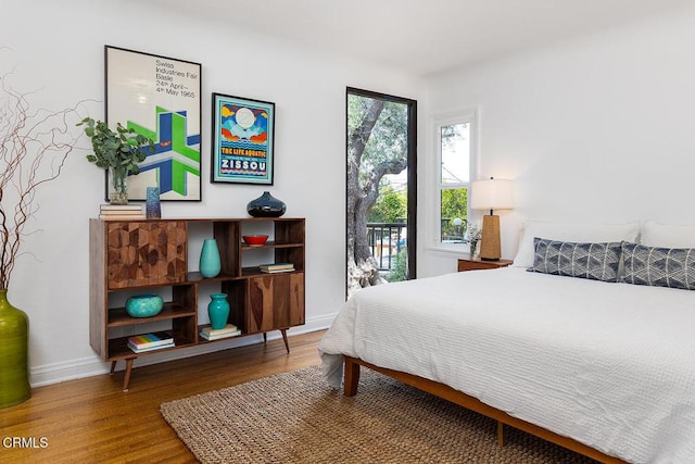 405 Sequoia Dr, Pasadena, CA 91105 - bedroom with access to outside and wood finished floors