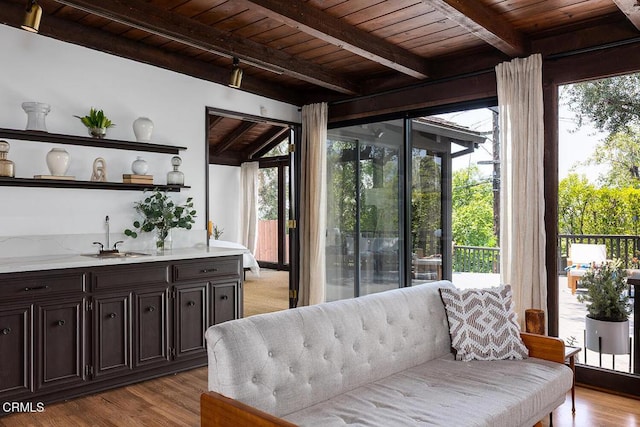 405 Sequoia Dr, Pasadena, CA 91105 - sitting room featuring a wooden ceiling with exposed beams, wet bar, and light wood-style flooring