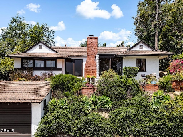 405 Sequoia Dr, Pasadena, CA 91105 - view of front facade with stucco siding and a chimney