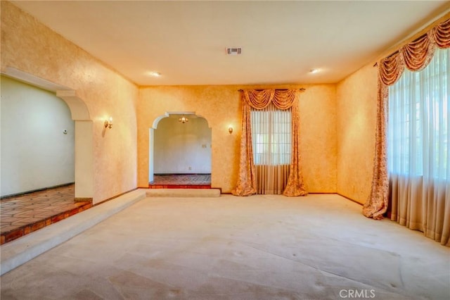 2033 Benbow Pl, Riverside, CA 92506 - carpeted spare room featuring arched walkways