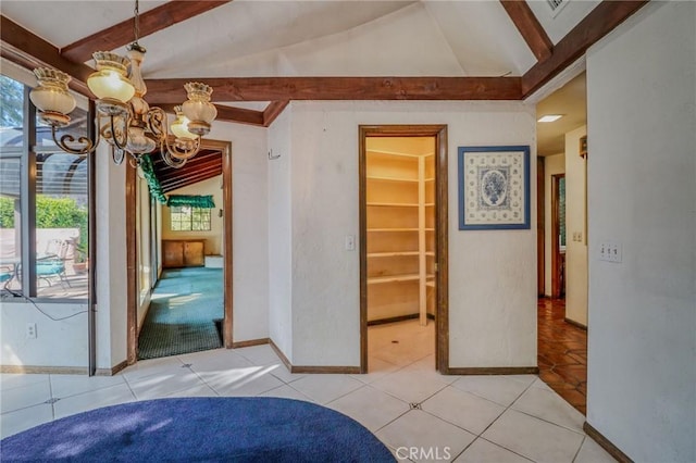 2033 Benbow Pl, Riverside, CA 92506 - unfurnished dining area with healthy amount of natural light, a chandelier, and light tile patterned flooring