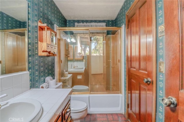 2033 Benbow Pl, Riverside, CA 92506 - full bathroom with wallpapered walls, shower / bath combination with glass door, and vanity