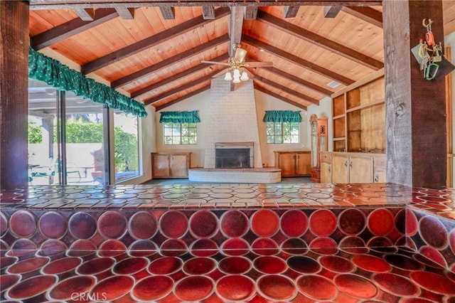 2033 Benbow Pl, Riverside, CA 92506 - living area with a wood ceiling with exposed beams, plenty of natural light, high vaulted ceiling, a ceiling fan, and a fireplace
