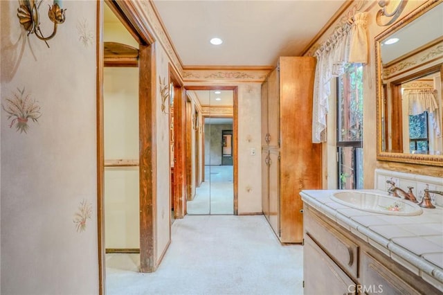 2033 Benbow Pl, Riverside, CA 92506 - bathroom with crown molding, double vanity, plenty of natural light, and recessed lighting