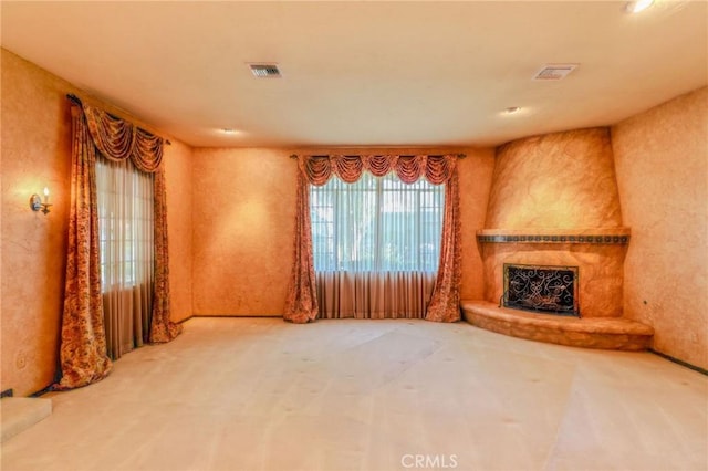 2033 Benbow Pl, Riverside, CA 92506 - unfurnished living room with carpet and a high end fireplace