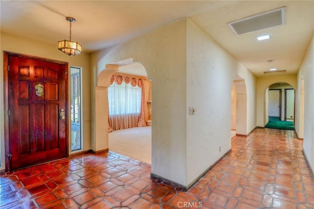 2033 Benbow Pl, Riverside, CA 92506 - entrance foyer featuring arched walkways and baseboards