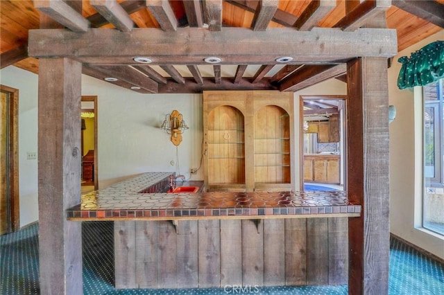 2033 Benbow Pl, Riverside, CA 92506 - indoor wet bar featuring beamed ceiling and carpet