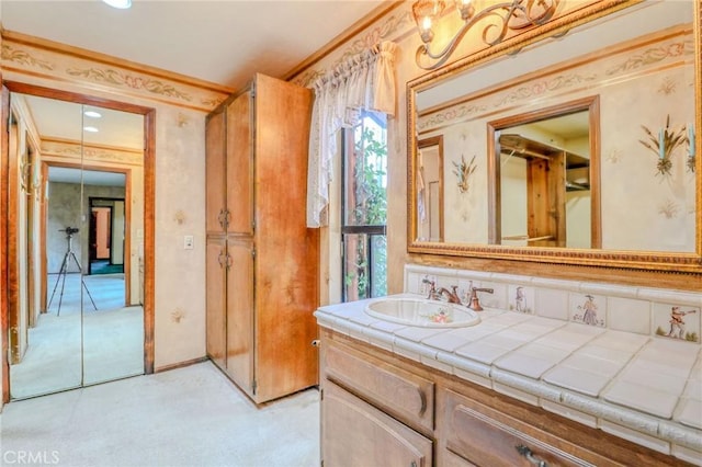 2033 Benbow Pl, Riverside, CA 92506 - bathroom with wallpapered walls and vanity