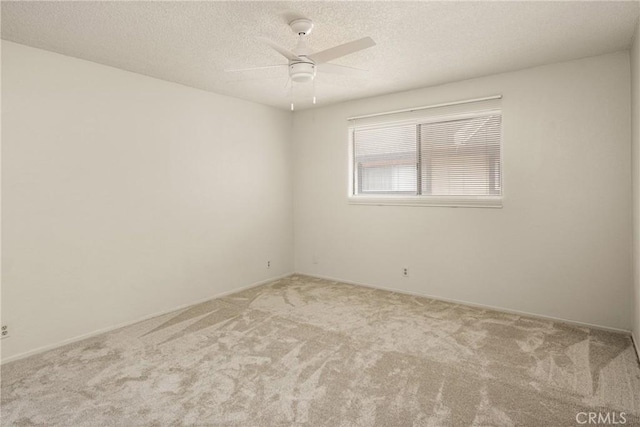 14000 Cerise Ave, Hawthorne, CA 90250 - carpeted empty room with ceiling fan and a textured ceiling