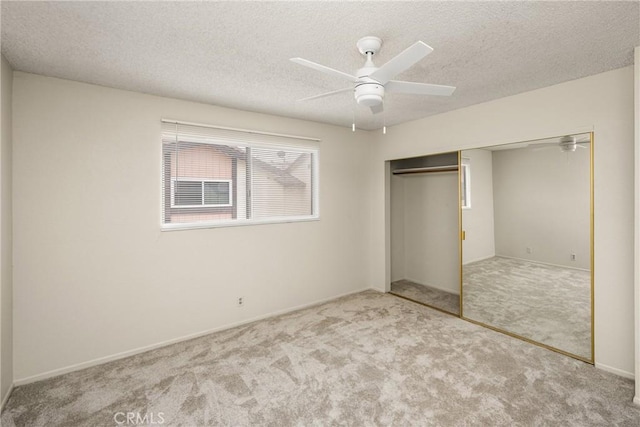 14000 Cerise Ave, Hawthorne, CA 90250 - unfurnished bedroom with carpet floors, a closet, a textured ceiling, and ceiling fan