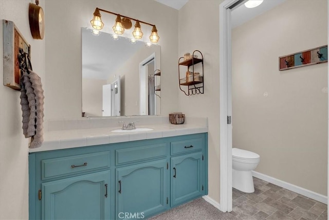 801 Vine St, Exeter, CA 93221 - bathroom with baseboards and vanity