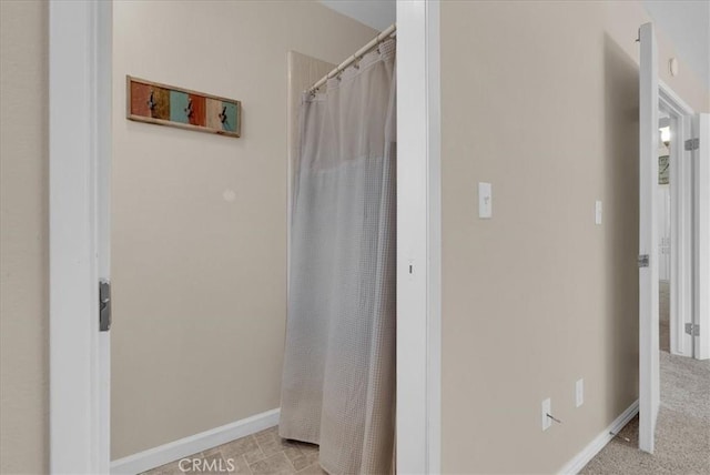 801 Vine St, Exeter, CA 93221 - full bathroom featuring baseboards and curtained shower