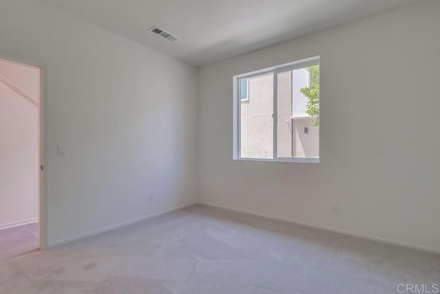 5305 Seacliff Pl Unit 5, San Diego, CA 92154 - spare room featuring light carpet and baseboards