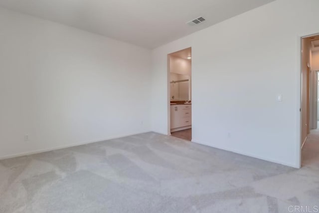 5305 Seacliff Pl Unit 5, San Diego, CA 92154 - unfurnished bedroom featuring light colored carpet and ensuite bathroom