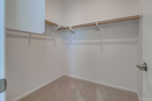 5305 Seacliff Pl Unit 5, San Diego, CA 92154 - spacious closet featuring carpet floors