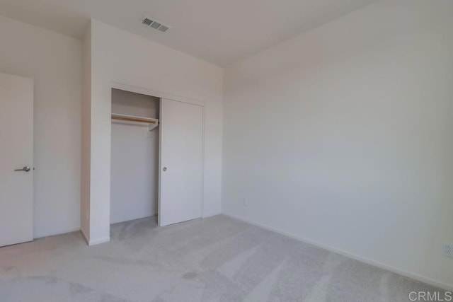5305 Seacliff Pl Unit 5, San Diego, CA 92154 - unfurnished bedroom featuring light colored carpet and a closet