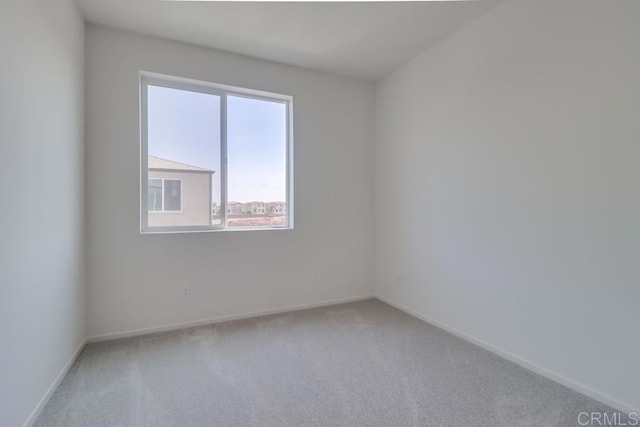 5305 Seacliff Pl Unit 5, San Diego, CA 92154 - empty room with light colored carpet and baseboards