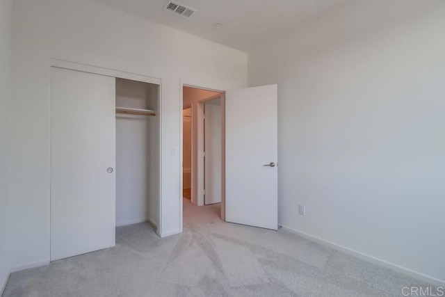 5305 Seacliff Pl Unit 5, San Diego, CA 92154 - unfurnished bedroom featuring light carpet and a closet