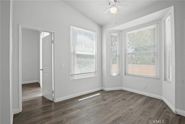 19431 Rue De Valore Unit 5C, Lake Forest, CA 92610 - unfurnished room featuring dark wood finished floors, lofted ceiling, ceiling fan, and healthy amount of natural light