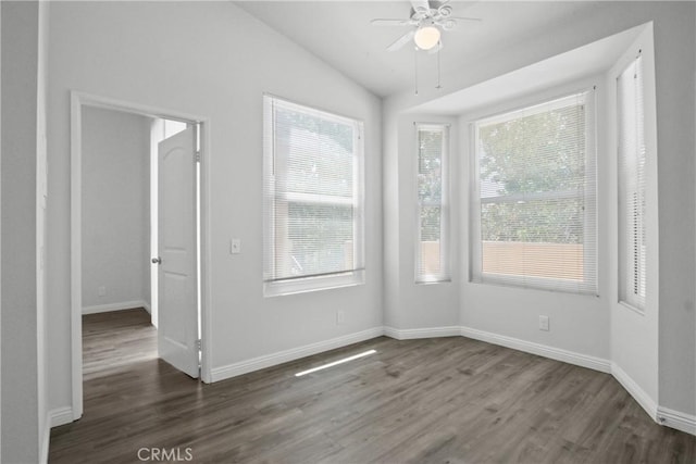 19431 Rue De Valore Unit 5C, Lake Forest, CA 92610 - spare room featuring dark wood-style floors, vaulted ceiling, plenty of natural light, and a ceiling fan