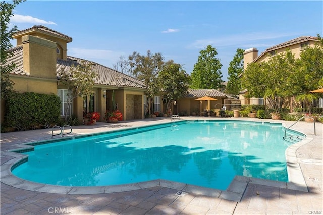 19431 Rue De Valore Unit 5C, Lake Forest, CA 92610 - community pool featuring a patio