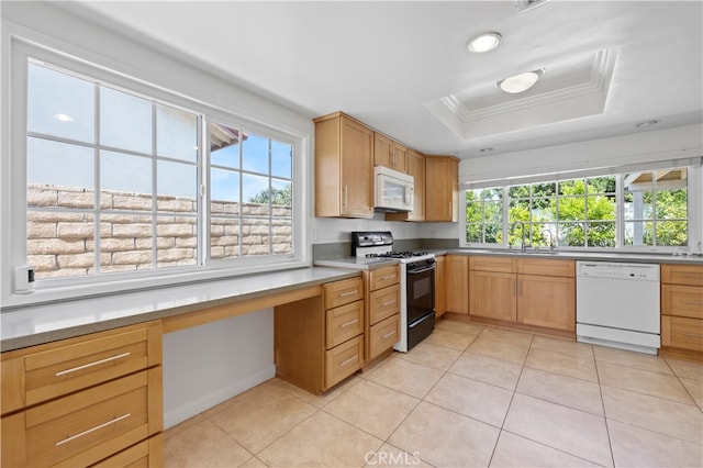1736 Park Lawn Rd, Hacienda Heights, CA 91745 - kitchen with white appliances, built in desk, ornamental molding, plenty of natural light, and a tray ceiling