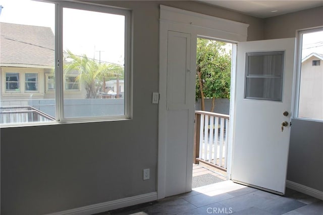 508 S Orange Ave, Santa Ana, CA 92701 - doorway to outside featuring baseboards