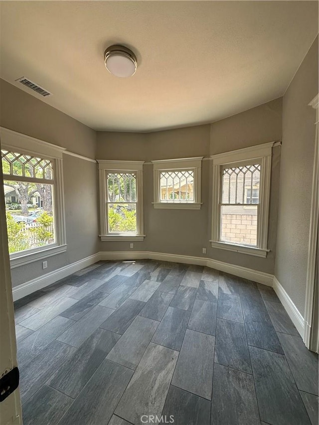 508 S Orange Ave, Santa Ana, CA 92701 - unfurnished room with baseboards and wood finish floors