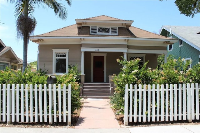 508 S Orange Ave, Santa Ana, CA 92701 - view of front of home featuring a porch and a fenced front yard